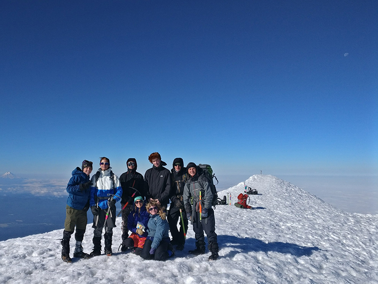 students summiting mt adams with ice axes and crampons