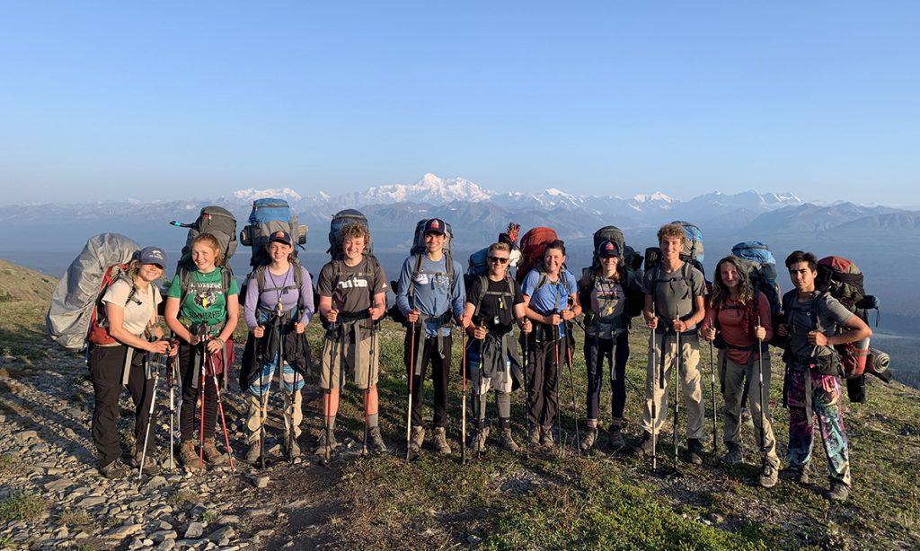 students hiking with backpacks denali mountains